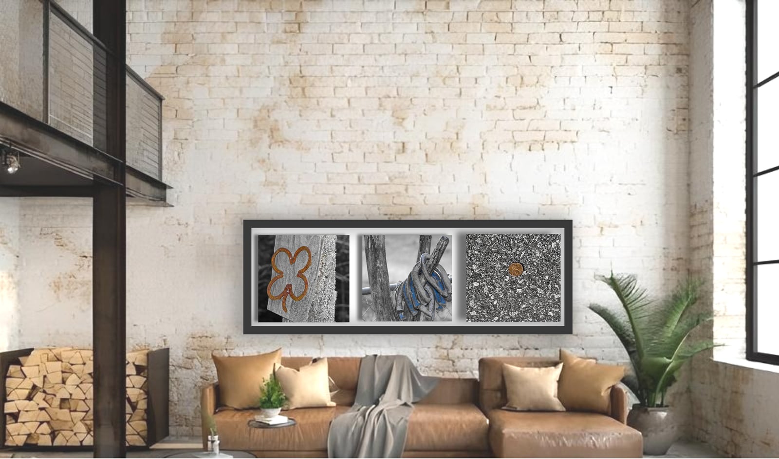 A long framed triptych above a leather sofa in an industrial loft